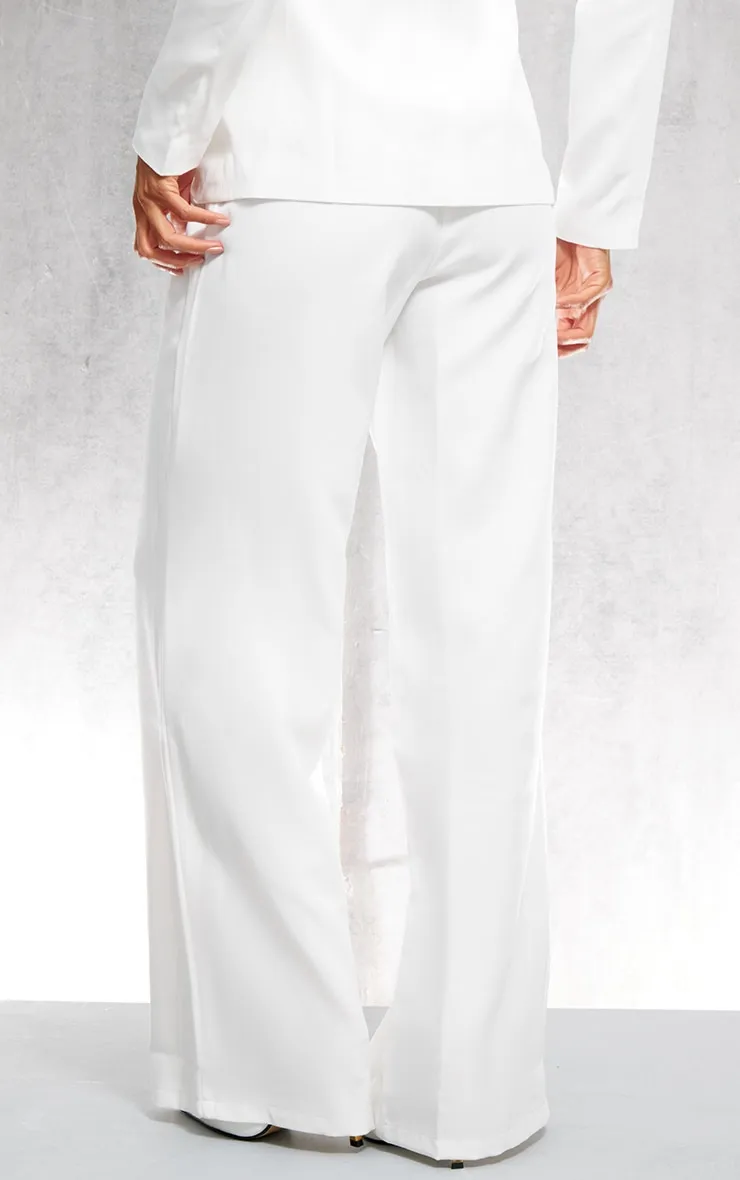 Pantalon large blanc à ourlet fendu