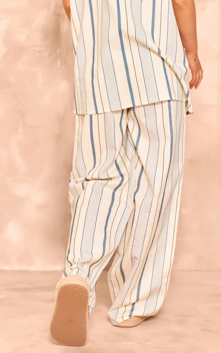 Pantalon taille haute style tailleur effet lin bleu à rayures